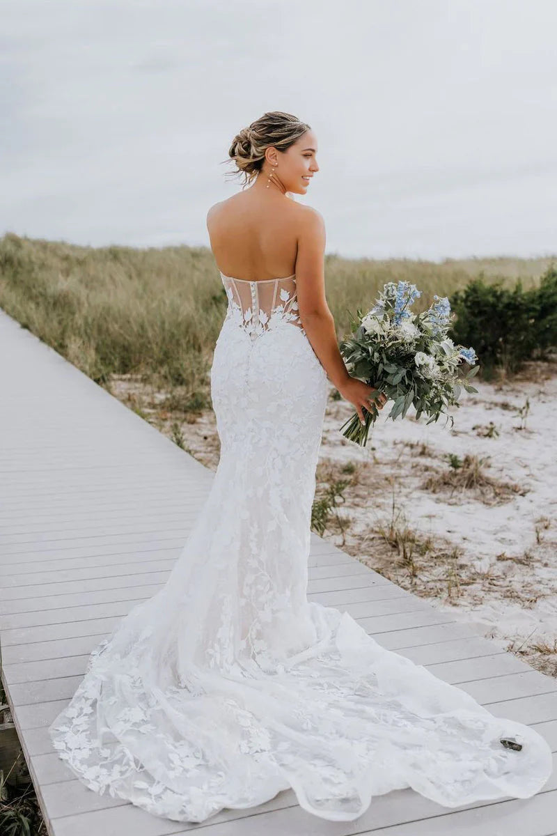 Vestidos de novia de tul con escote corazón y apliques de sirena y mangas